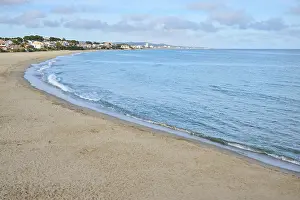 Sandy Ocean Shores Prints: Breaking waves on a sandy beach