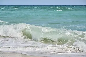 Southern Europe Beaches Prints: Breaking waves on a sandy beach