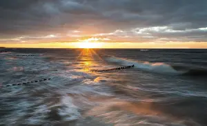 Long Exposure Beach Photography Prints: Breakwaters or groynes, sunset