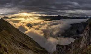 Backlit Mountain Range Prints: Bregenzerwald mountains with clouds below