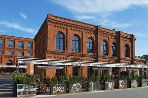 Prints of Brick architecture with large windows and decorations under a blue sky, Manufaktura, Łodź, Lodz, Lodz, Poland Brick architecture with large windows and decorations under a blue sky Lodz Prints: Brick Architecture Print, Manufaktura, Łódź, Poland