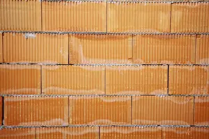 Deserted Construction Site Prints: Brick wall of a building shell