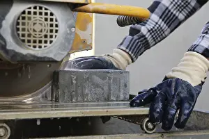 Construction Workers Prints: Bricklayer at the stone cutter