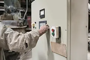 Industrial Building Interior Prints: Brickworks. Master controls machine from remote panel