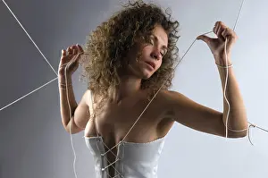 Marriage Love Prints: The bride has unbuttoned a corset and bare back