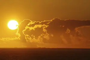 Scottish Evening Atmosphere Prints: Bright sunset on the horizon with dramatic clouds