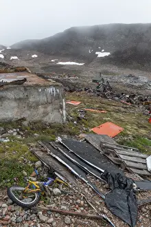 East Greenland Landscape Prints: Broken children's bicycle