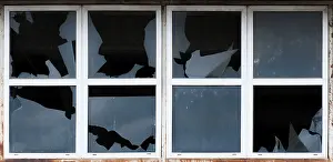 Broken Windows Prints: Broken windows of old building. White frames