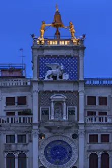Uninhabited Historic Quarter Prints: Two bronze figures ring the bell on the clock tower