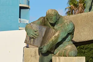 Deserted Canary Islands Prints: Bronze statue, man with cube, close