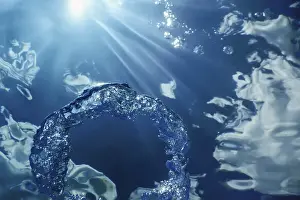 Deserted Underwater Scene Prints: Bubble Ring Underwater ascends towards the Sun
