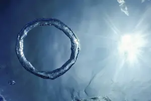 Underwater Ring Prints: Bubble Ring Underwater ascends towards the Sun