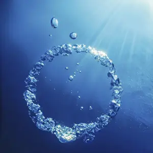 Deserted Underwater Scene Prints: Bubble Ring Underwater ascends towards the Sun