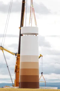 Ecofriendly Renewable Energy Prints: Building and assembling a construction windmill by crane