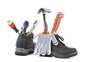 Wild Animal Photography Studio Prints: The building tools and boots. Isolated on a white background