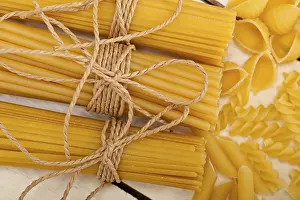 Rustic Table Setting Prints: Bunch of Italian pasta type on a white rustic table