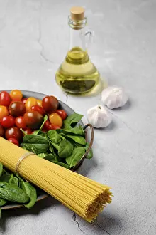 Olive Oil Recipes Prints: A bunch of raw spaghetti with spinach