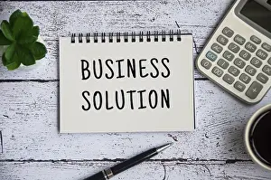 Conceptual Photo Symbolism Prints: Business solution on notepad. Business solution concept
