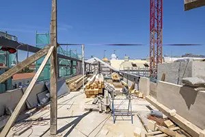 Urban Architecture Design Prints: A bustling construction site with timber