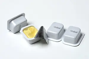High Calorie Dairy Product Prints: Butter in breakfast portion, portion pack