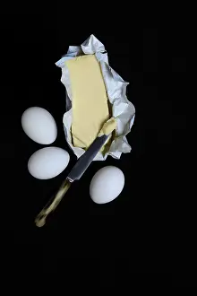 Dairy Product Still Life Prints: Butter in opened packaging and eggs