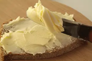 Freshly Baked Bread Prints: Buttered bread