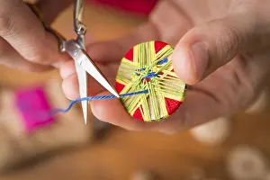 Regional Handicrafts Germany Prints: Button maker cutting blue yarn