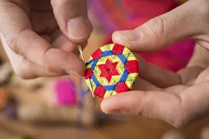 German Handicrafts Prints: Button maker stitching and wrapping green