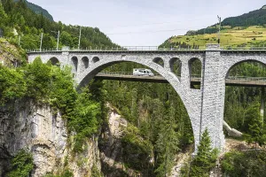 Prints of Camper van passing bridge at Solis Viaduct, Switzerland Heritage Site Prints: Camper Van at Solis Viaduct Print, Switzerland