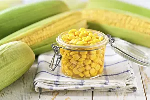 Tin Can Food Prints: Canned sweet corn in jar on a white table