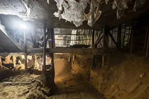Heavy Duty Construction Equipment Prints: A captivating view of an underground tunnel under construction