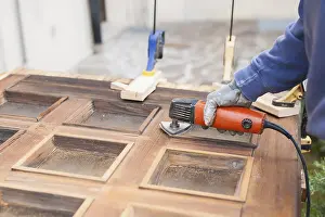 Carpenter At Work Prints: Carpenter at work with angular Sander