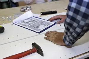 Carpenter At Work Prints: Carpenter at work in his carpentry workshop