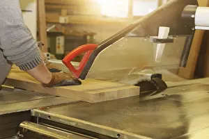 Carpenter At Work Prints: Carpenter at work in his carpentry workshop