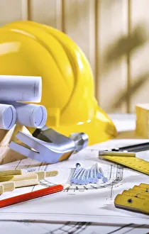 Construction Industry Equipment Prints: Carpentry tools on table with blueprints