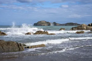 Wave Crashing On Rocks Prints: Castlepoint Beach and Castlepoint Lighthouse