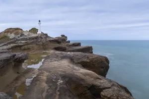 Motion Blur Coastal Scene Prints: Castlepoint lighthouse on a rock