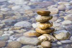 Rocky Coastline Photo Prints: Stack of pebbles on the beach