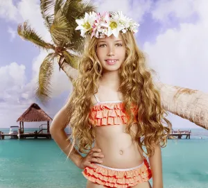Vintage Beach Style Prints: Beach tropical vacation kid blond girl with fashion flowers in head and palm tree vintage color