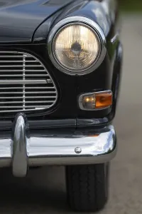 Swedish Car Manufacturer Prints: Front round front light and front section with chrome bumper