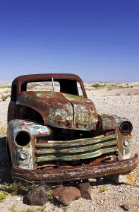 Scrap Metal Trade Prints: Rusty car on the road