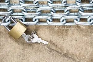 Deserted Background Prints: Chains and lock on the dirty grunge background