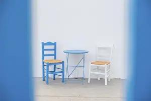 White Wall Decor Prints: Two chairs, one blue and one white
