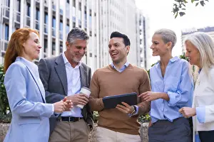 Businesswoman On Tablet Prints: Chatting and seeing work stuff on a tablet