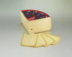 Light Background Food Images Prints: Cheese on a light background, studio shot