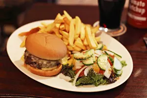 Gastronomy In Europe Prints: Cheeseburger with chips and salad