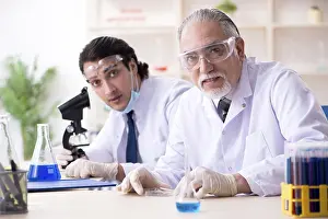 Virus Analysis Prints: Two chemists working in the lab