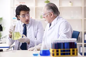 Scientific Experiment Prints: Two chemists working in the lab