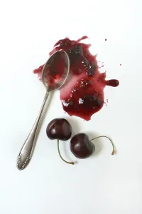 Studio Shot Of Cherries Prints: Cherry jam with spoon, cherries