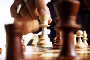 Chess Piece Prints: Chess player making a move